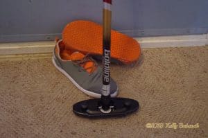 Chaussures de curling et brosse